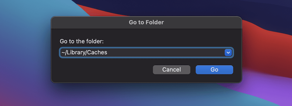 Finding the Library/Caches folder within macOS.